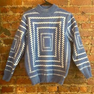 Blue patterned size L sweater.